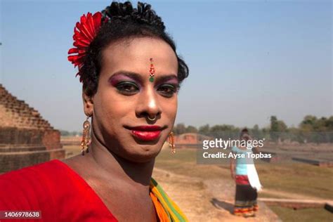 Bangladeshi hijra with young boy .
